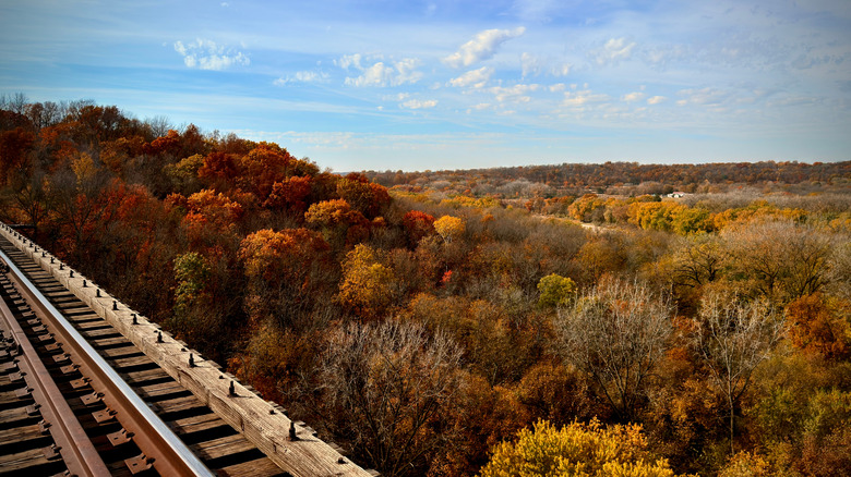 Autumn foliage in the countryside next to a railroad track near Boone, Iowa