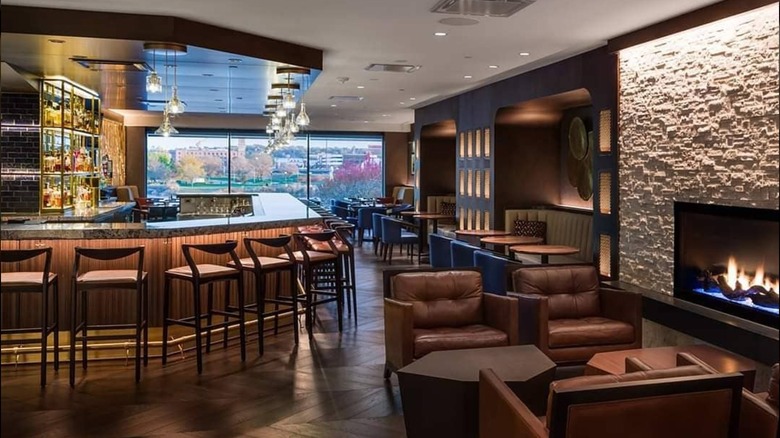 Tables with a view and the bar area at Kahill's Chophouse