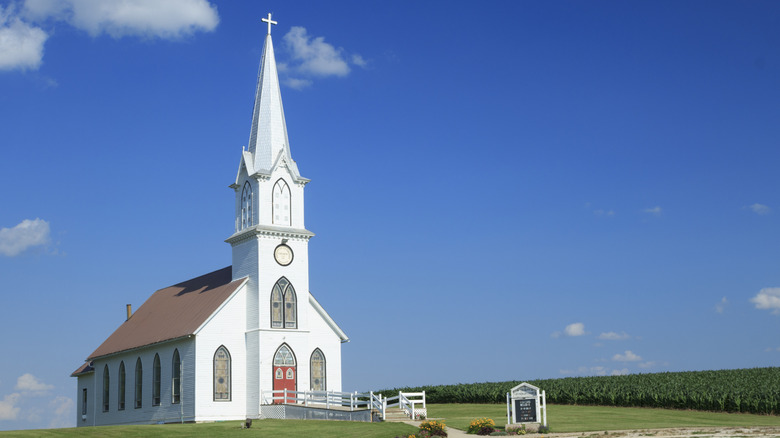 The Trinity Lutheran Church against a blue sky in Manning, Iowa