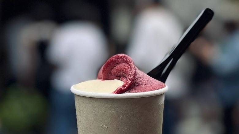 Scoop of Minimal gelato in cup with spoon