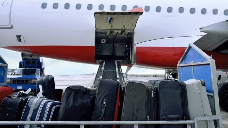 Luggage being loaded onto a plane