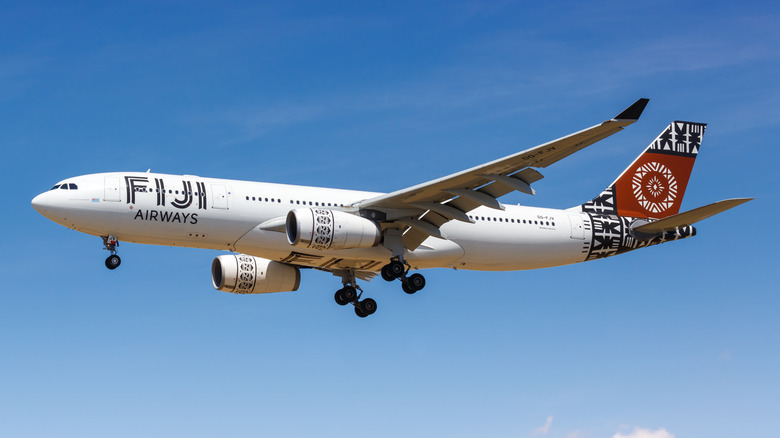 A Fiji Airways plane flying mid-air