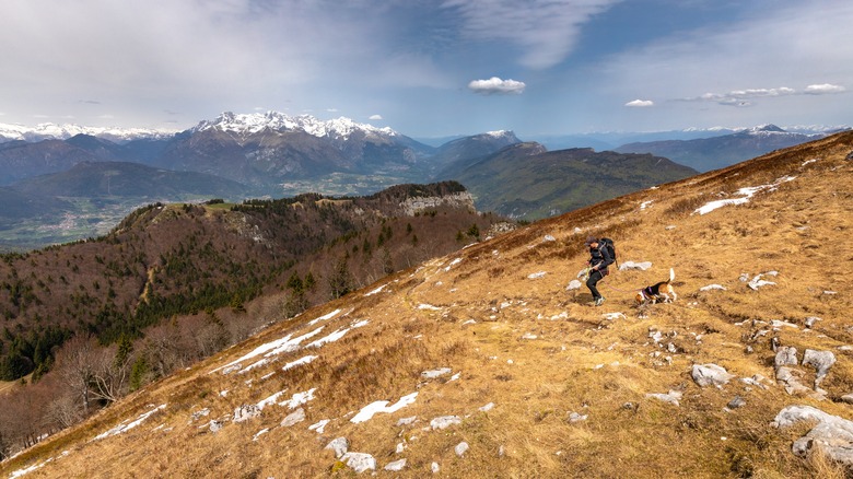 A hiker walking on Monte Misone above Arco