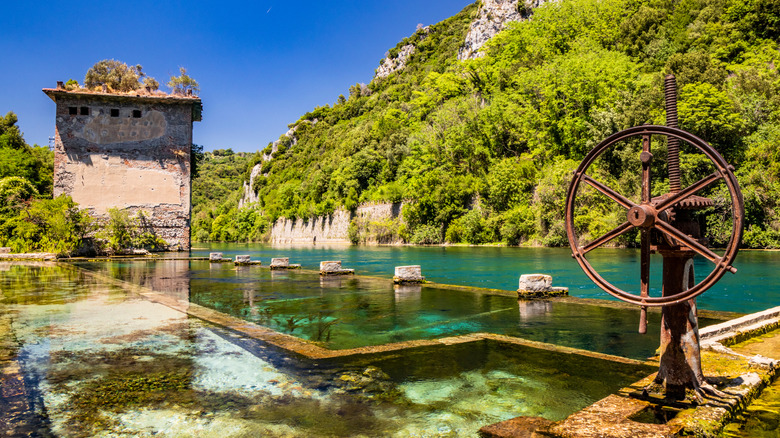 The shipyard ruins amidst emerald green waters at Morica Springs
