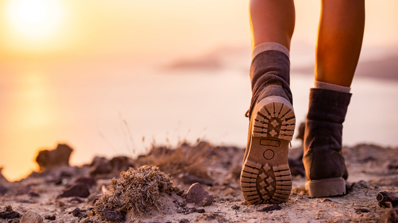 Soemone wearing hiking boots while on a walk