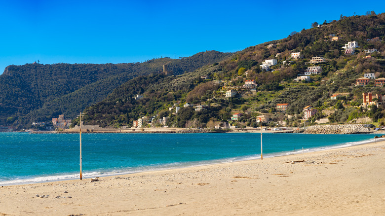 The golden sand of Fishermen's Beach in Noli, Italy.