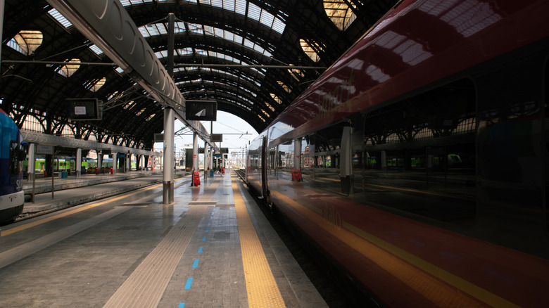 Inside Milan central station with no trains stopped