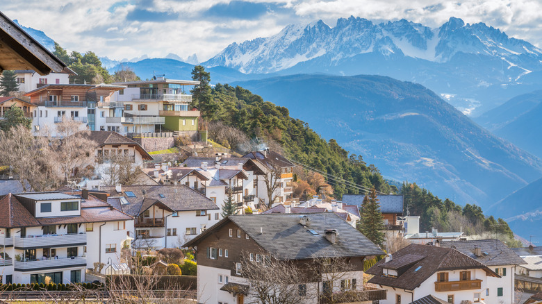 San Genesio village with jagged mountain backdrop