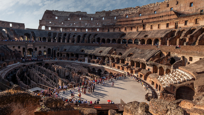 Tourists milling inside Rome's Colosseum