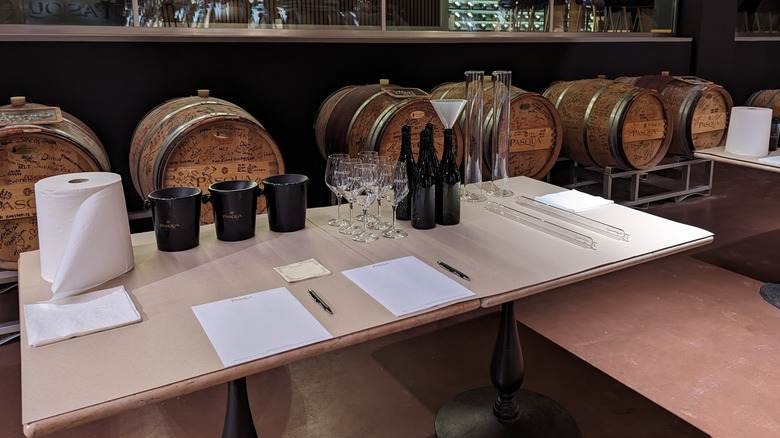 Barrels and wine blending station
