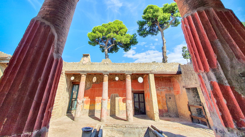 A well-preserved temple in the ruined city of Herculaneum, Italy, still with brightly colored paintings