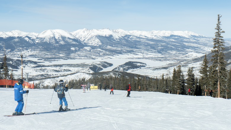 Skiers enjoying bluebird day at Keystone Resort in Colorado