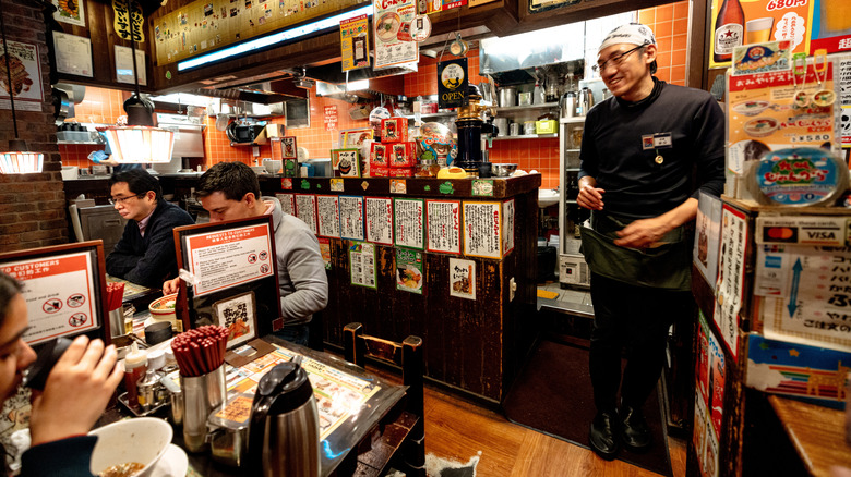 Ginza, Japan ramen restaurant with chef talking to patrons