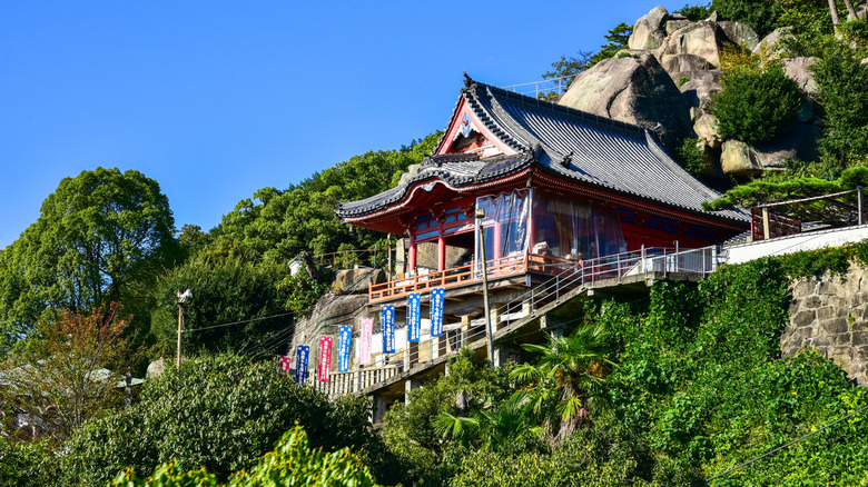 Senkoji Temple, nestled on a mountain beneath a blue sky in Onomichi, Japan