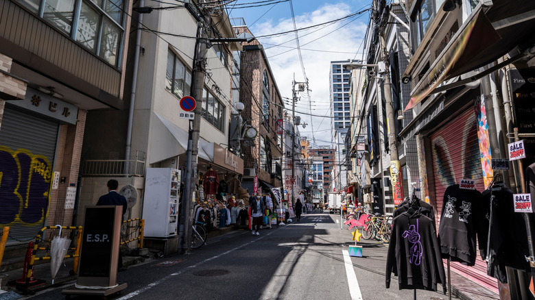 Amemura streets, Osaka, alleyway with clothing on display