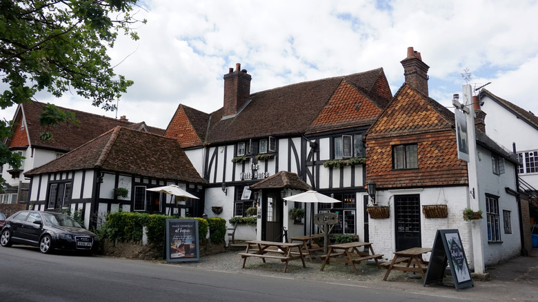Outside the White Horse in Shere, Surrey