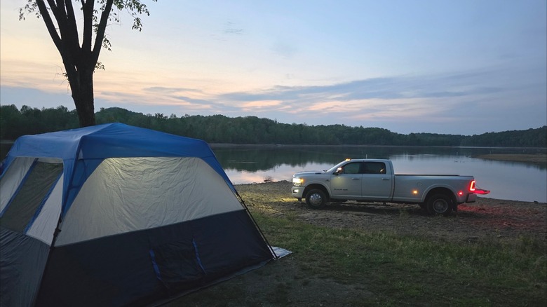Vehicle parked at a waterfront primitive campsite at Nolin Lake State Park, Kentucky