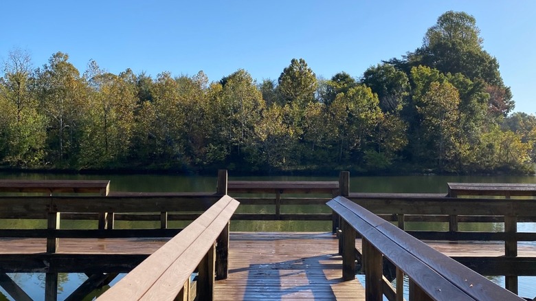 Wooden boardwalk extending over the lake at Nolin Lake State Park, Kentucky