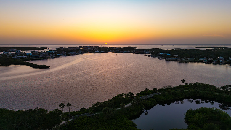 sunset by the water