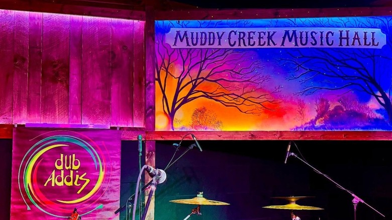 Muddy Creek Music Hall sign on stage