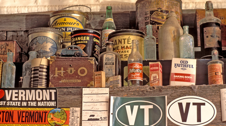 Vintage bottles and cans in a Vermont antique store.