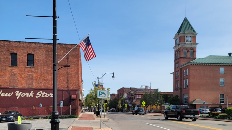 Downtown street in Lancaster, New York, with the opera house clock tower
