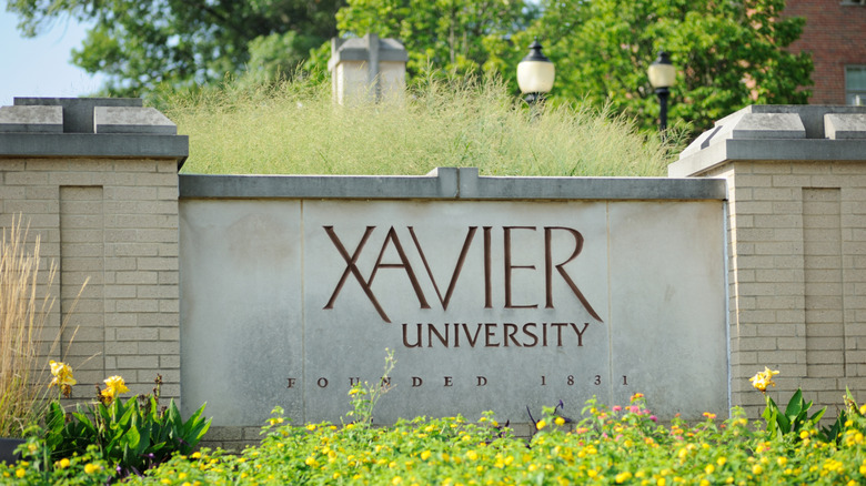 A close up photo of the Xavier University wall plaque