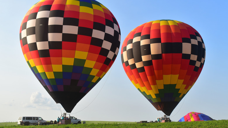 Hot air balloons awaiting takeoff at Indianola's National Balloon Classic
