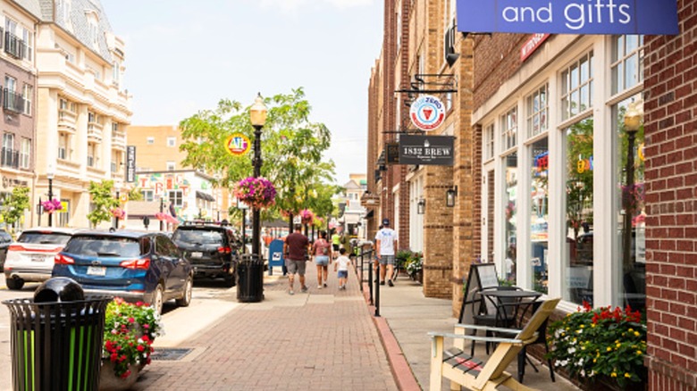 Downtown Carmel, Indiana with tree-lined streets, shops, and restaurants