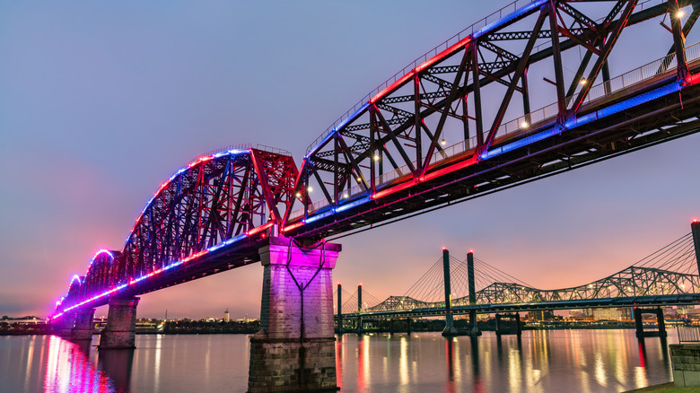 Big four bridge lit up at sunset