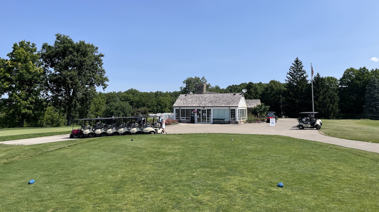 Golf carts and clubhouse at the Whitnall Park Golf Course in Wisconsin