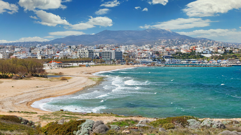 Rafina city buildings and beach by the sea