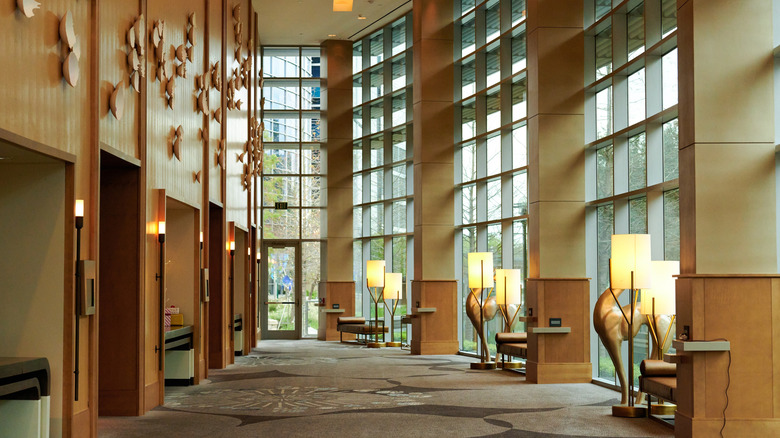 Warm lights and floor-to-ceiling windows in The Woodlands Waterway Square