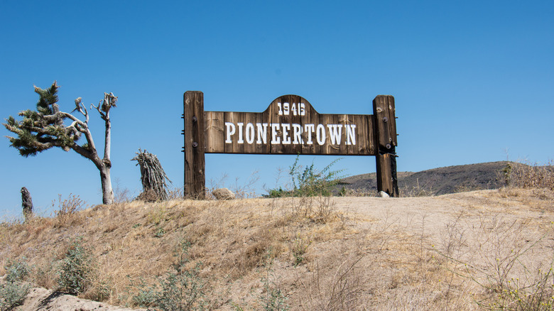 A wooden sign welcomes visitors to Pioneertown