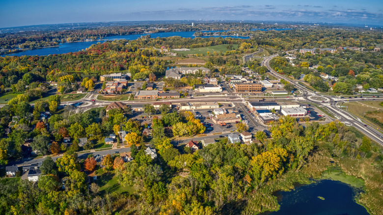 Aerial view of town surrounded by lakes and trees in Prior Lake, MN