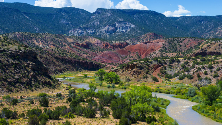 The Chama River winding through a colorful canyon in Santa Fe National Forest