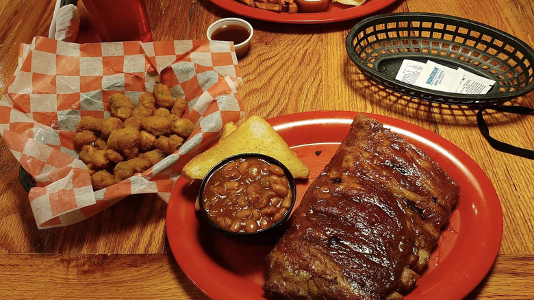 A meal at Heady BBQ Co. in Republic, Missouri, displayed on a wooden surface