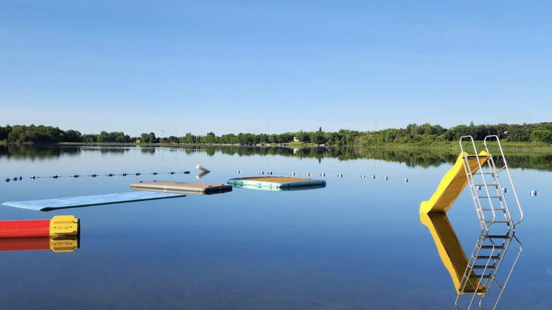 Slide and floating platforms at Swan Lake Resort and Campground