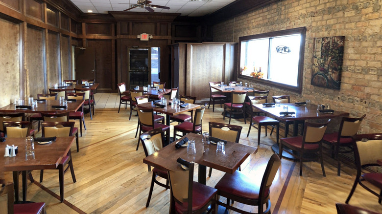 Empty dining room and brick walls at Rigo's Place in Kankakee