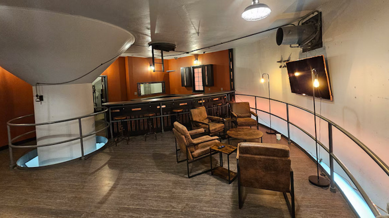 Chairs and bar stools at a kitchen inside former missile bunker at Atlas Ad Astra Adventure Resort