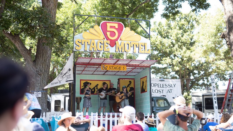 People performing at Stage 5 at the Walnut Valley Festival