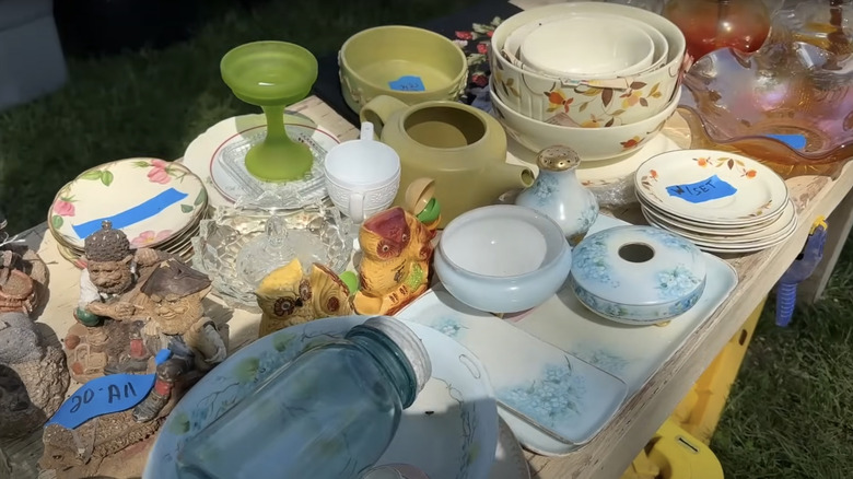 Table of antique dishes at the Sparks Antiques and Collectibles Flea Market.