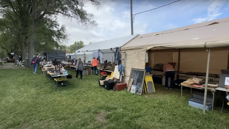 Outdoor tents with antiques at the Sparks Antiques and Collectibles Flea Market.