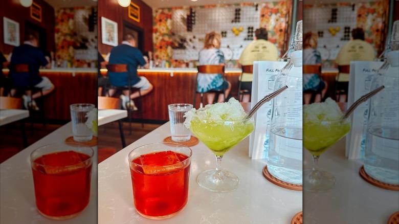 Two colorful cocktails at Wild Child Libations