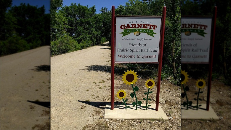 Welcome to Garnett sign on the Prairie Spirit Trail State Park in Kansas