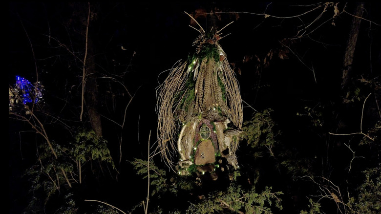 Gnome house lit up for the holidays at the Overland Park Arboretum & Botanical Garden
