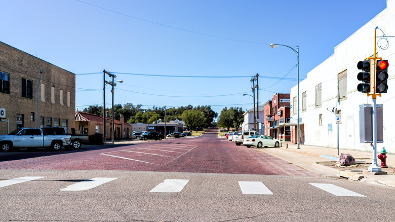 A street crossing in downtown Larned, Kansas on a sunny day