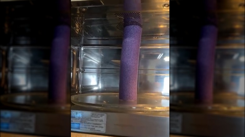 Using a pool noodle to keep microwave tray safe in an RV