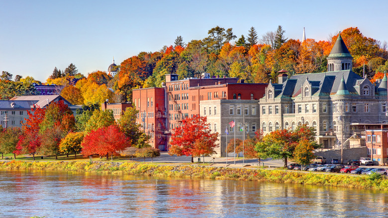 The tree-filled city of Augusta along the Kennebec River on a clear, autumn day in Kennebec County