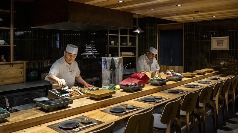 Chefs preparing sushi at Kizaki restaurant in Denver, Colorado